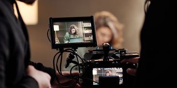 Behind the scenes shot of camera monitor during a video shoot.