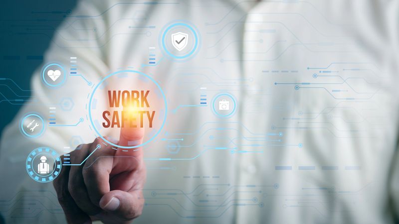 engineer pointing to icon , represents protection in safe work, both maintenance, health care, inspection of equipment and tools, in order to prevent potential hazards.