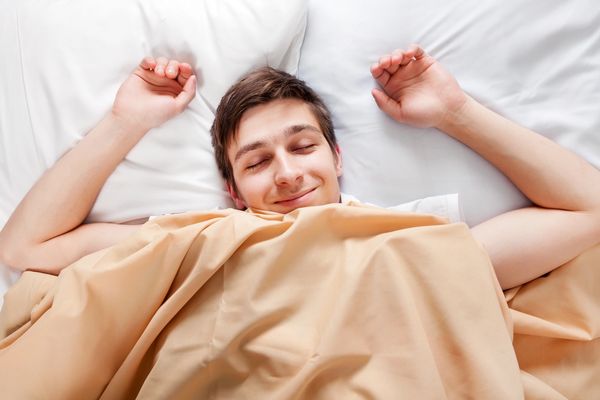 Young man sleeping comfortably.