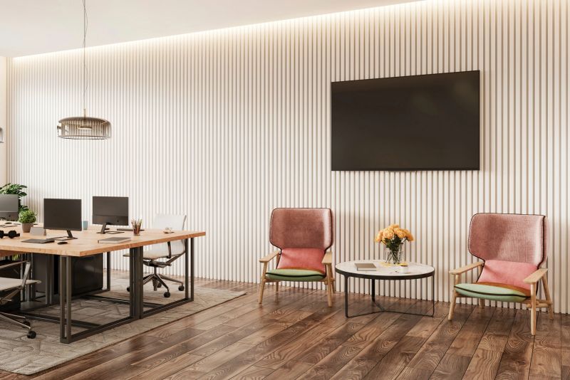 Modern office space interior. Armchairs, coffee table, desk, chairs, computers, TV set, parquet, carpet, white ceiling, deoration. Template for copy space. Render.
