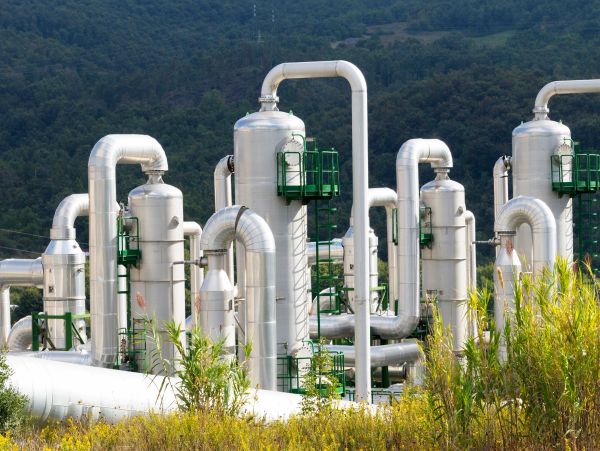 Industrial pipes and towers in a plant.