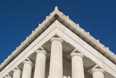 Close-up of classical columns and roof corner.