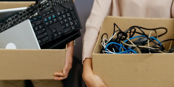 2 boxes of items demonstrating a box of items that we can and can not tak3e.