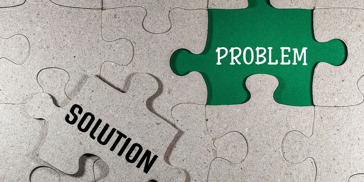 puzzle pieces of problem and solution