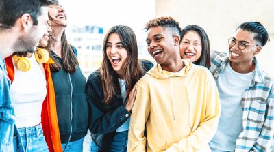 Group of friends laughing together.