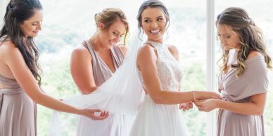 Bride with bridesmaids preparing for the wedding.