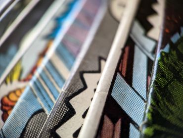 Close-up of patterned fabric or comic panels.