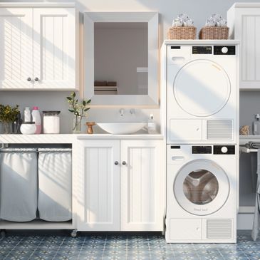 Bright and clean laundry room with stacked washer and dryer.