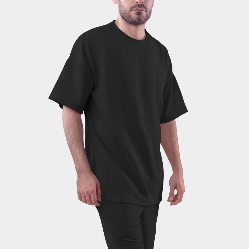 Black Mockup of an oversized men's t-shirt for design, print, pattern. Template of fashionable clothes on isolated background.