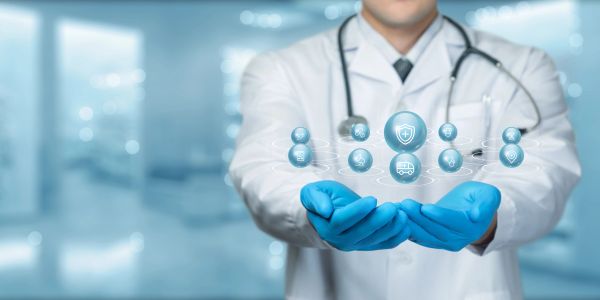 Doctor in gloves holding digital health icons.