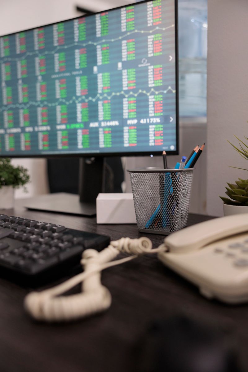 Computer monitor with real time stock market exchange trend, working remotely with global profit investment. Investment desk with money trading statistics, online currency hedge fund.