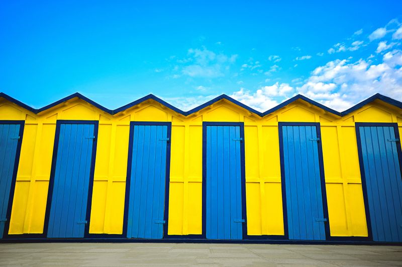 beach huts on a bright sunny day