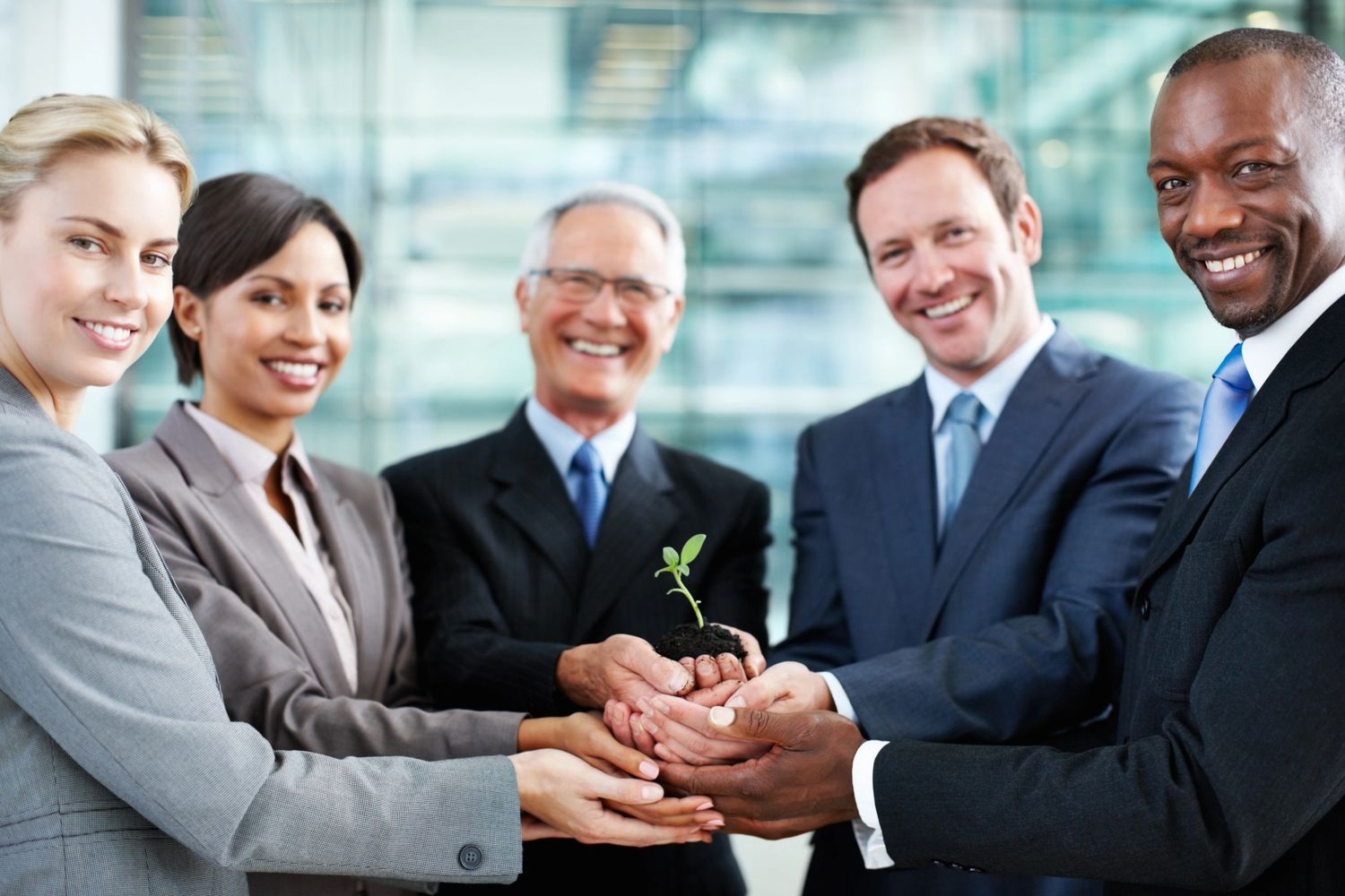 Businesswoman presenting a web process flowchart to colleagues in a meeting.