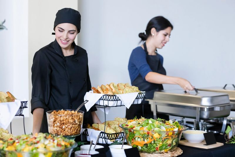 Chefs checking that there is nothing missing from the buffet