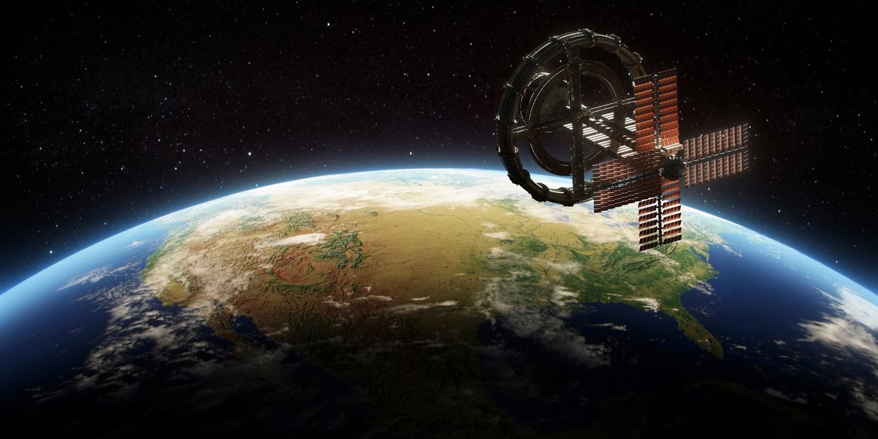 Space station orbiting Earth with solar panels.