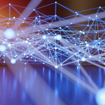 Abstract digital network with glowing blue nodes and connecting lines.