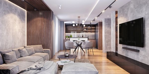 Modern living room with cozy seating and large wall mounted flat screen TV.