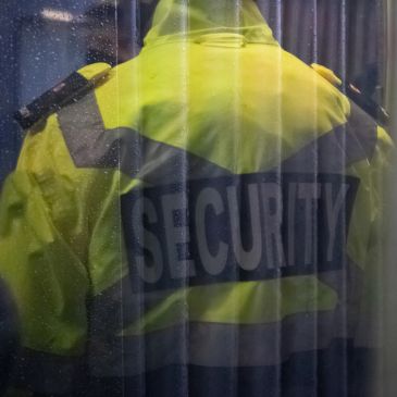 Rear view of a security guard jacket.