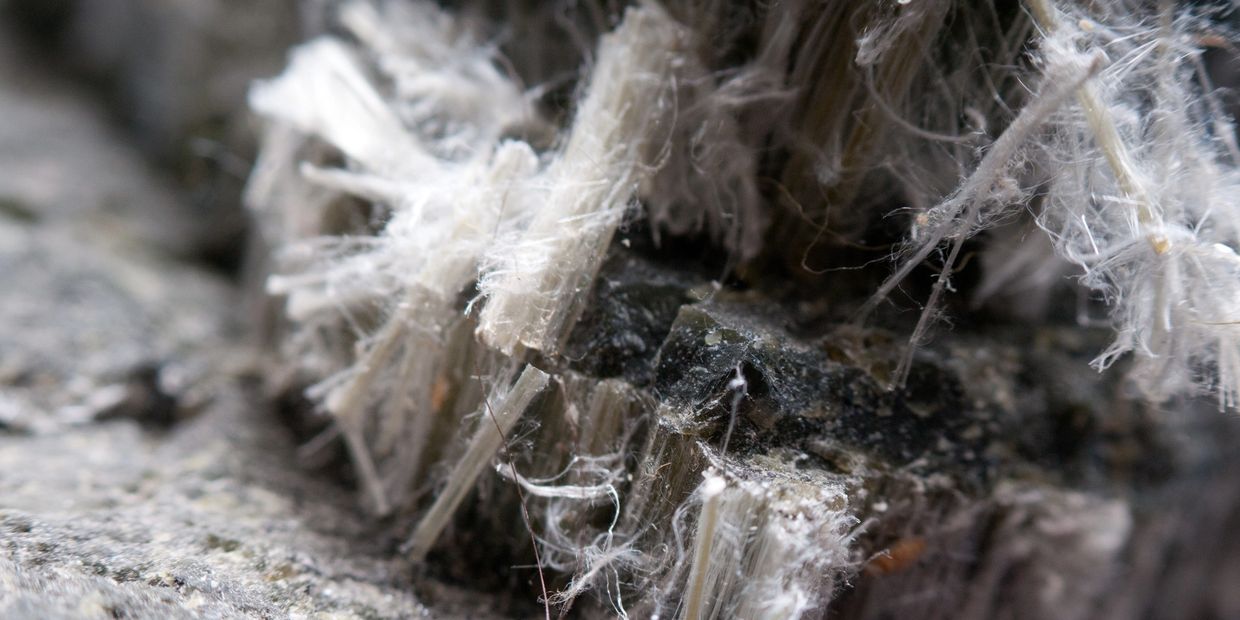 Asbetos embedded in building material.