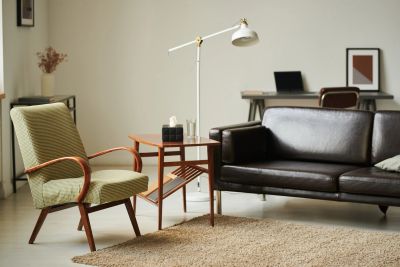 Cozy living room with modern furniture and warm lighting.