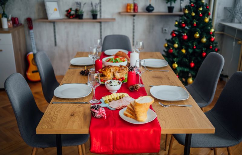 Decorated table set for lunch at Christmas time