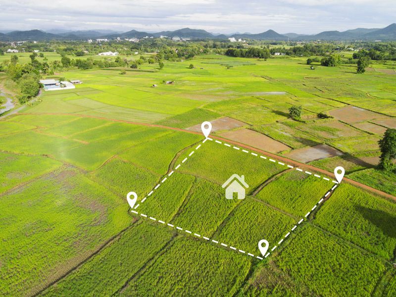 Land plot for building house aerial view, land field with pins, pin location for housing subdivision residential development owned sale rent buy or investment home or house expand the city suburb