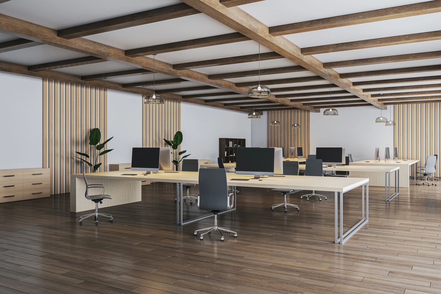 Modern open-plan office with wooden beams, desks, and computers.