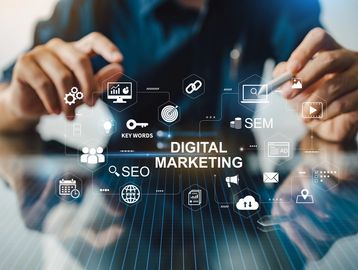 Hands interacting with digital marketing icons and data analytics.