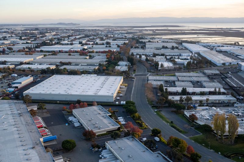 Aerial view of Industrial and commercial real estate. Helicopter point of view of industrial buildings.