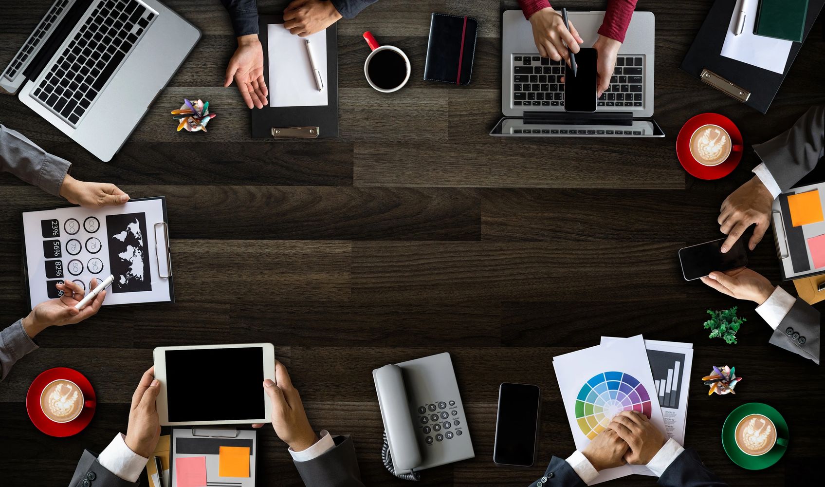 A senior leadership team collaborating during a strategy and execution planning session.