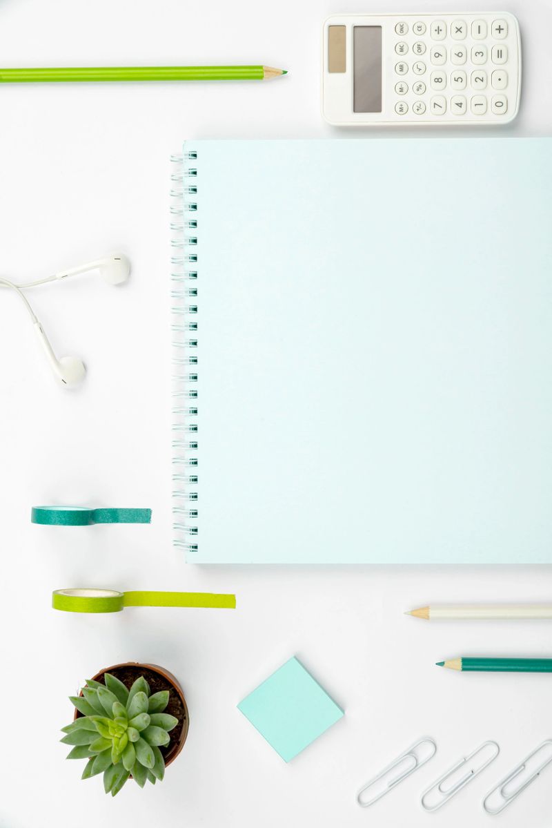 Office Supplies Over Desk With Keyboard And Glasses And Coffee Cup For Working