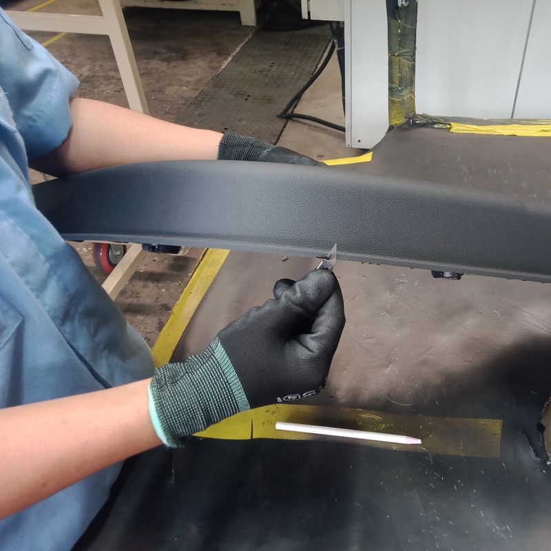 Hand portrait of a worker cutting goods