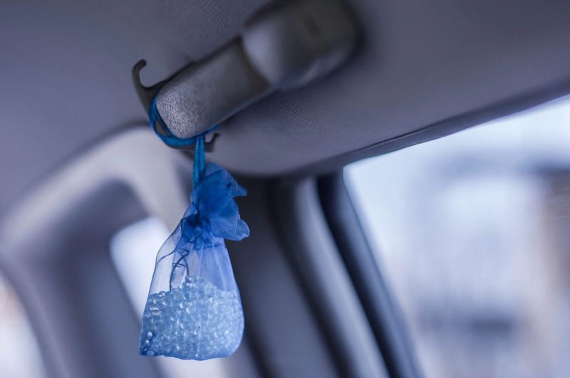 Blue bag of granules for a pleasant smell and aroma in the car