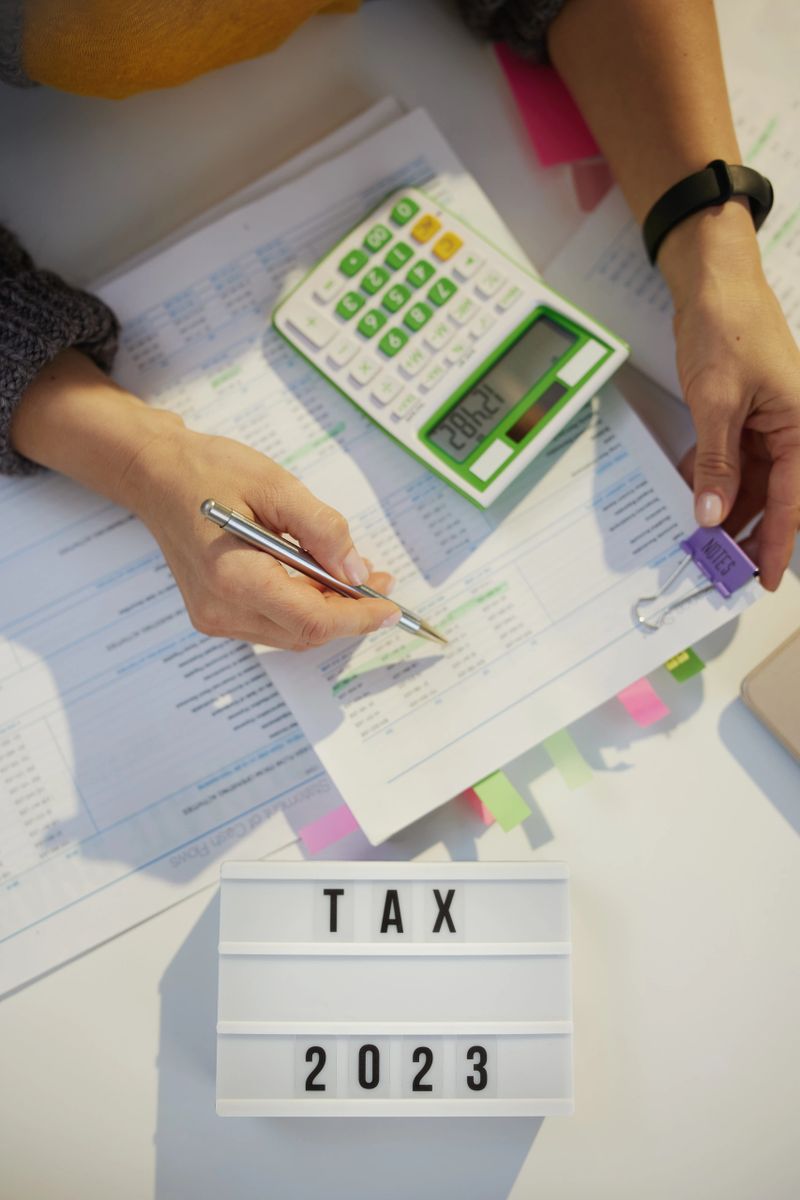 tax time. accountant woman working with documents in office.