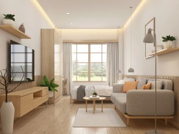 Bright, modern living room with neutral tones and natural light.