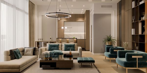 Modern living room with beige and teal furniture and warm lighting.
