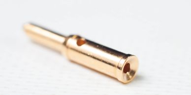 Metal pin with a selectively plated tip.