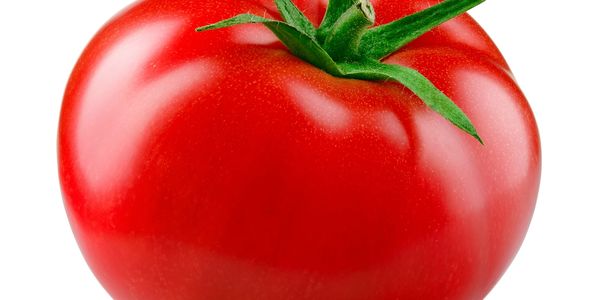 A ripe red tomato with green leaves on top.