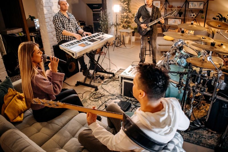 Music band at home rehearsing before performance