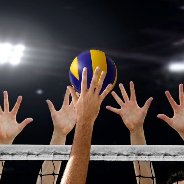 people trying to catch the volleyball