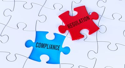 Puzzle pieces labeled Compliance and Regulation fitting together.