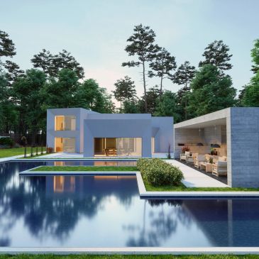 Modern white house with pool and outdoor seating area surrounded by trees.