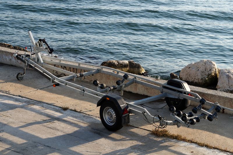 car trailer for transporting boats on the sea pier.