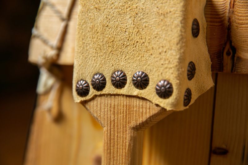 A back view of an old wooden medieval shield