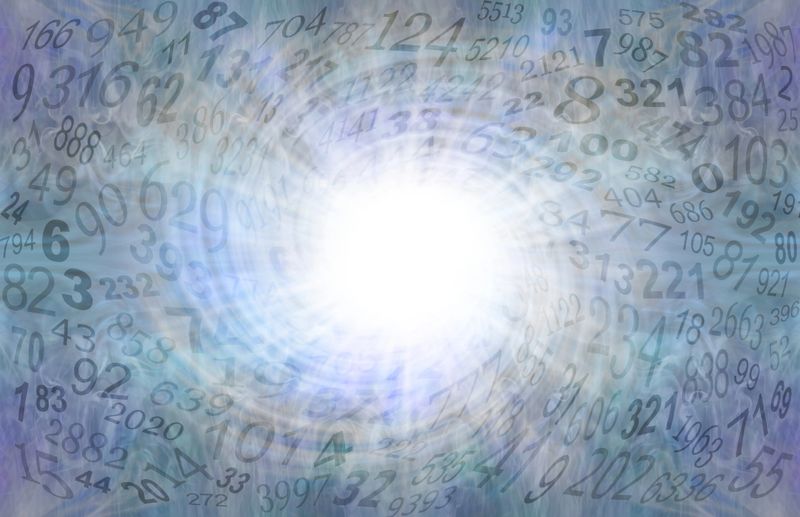 large bright white vortex surrounded by a swirl of random numbers against a blue background