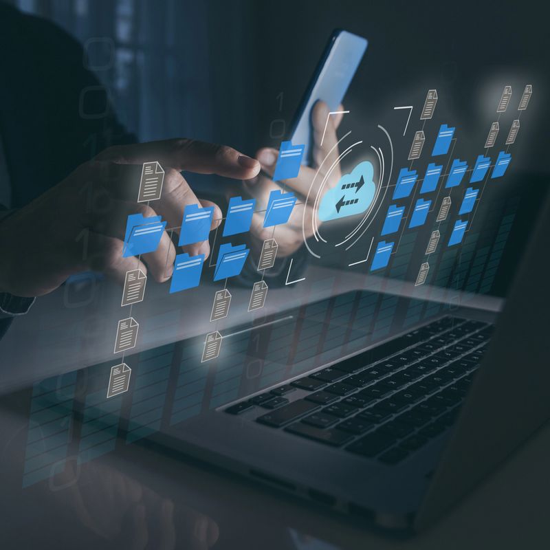 Businessman working on virtual screen with digital documents. Manage online documentation database.