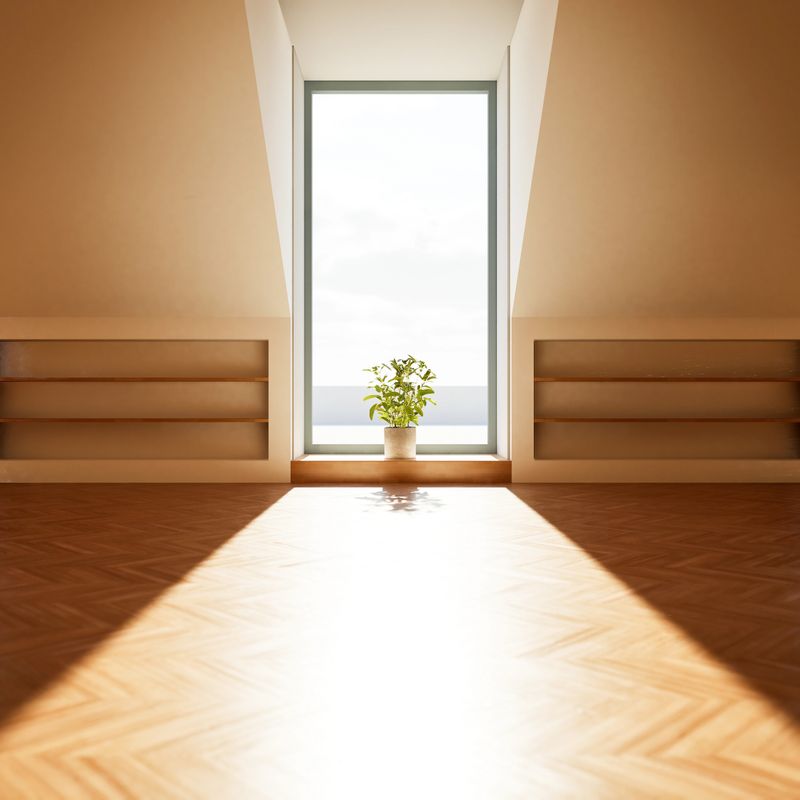 empty living room with big window, wood floor, stair at the daylight.