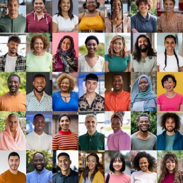 A diverse group of people expressing happiness and confidence.