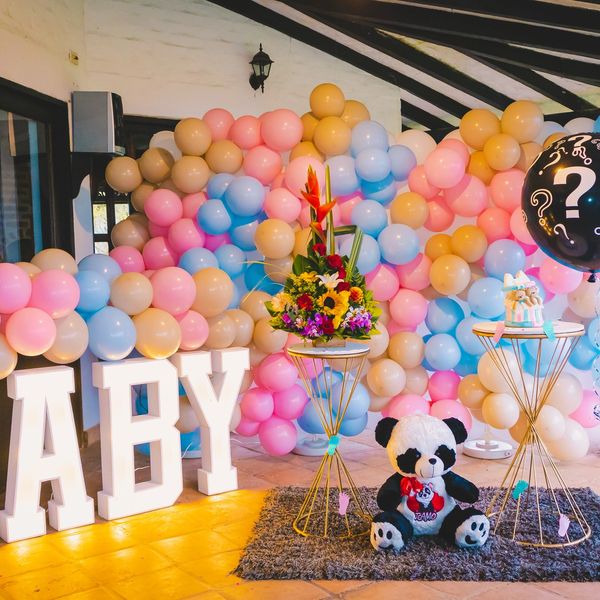 lots of balloons decorating a baby shower, or gender reveal party in boston ma