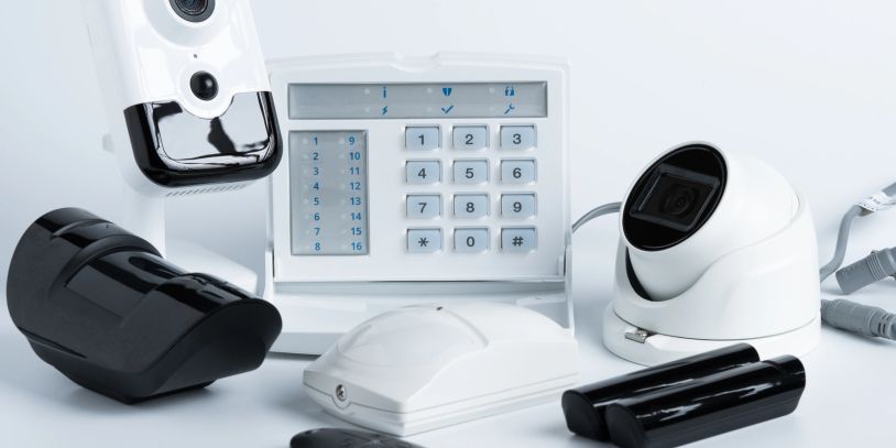 Security system components including cameras and keypad.